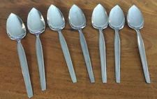 7 Wm. Rogers Stainless Serrated Grapefruit Spoons