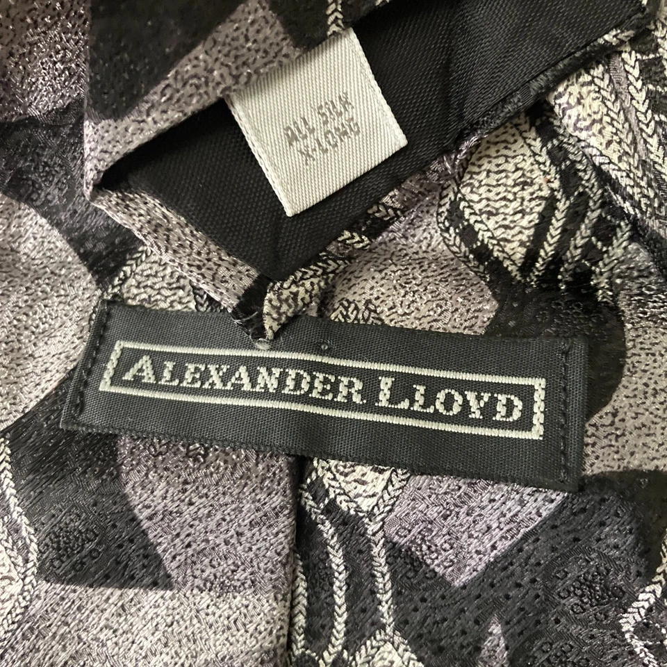 Corbata Alexander LLoyd para hombre negra plateada patrón novedoso Foto 2 de 4
