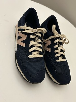 New Balance 620 women's sneakers in a navy blue and pink colorway. Size 6.5
