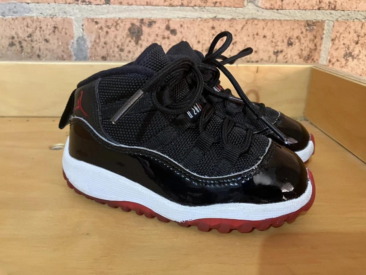 Air Jordan 11 Retro child Black White Red US7C 378040-061 very good condition