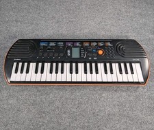 CASIO SA-76 44-key Mini Electronic Keyboard 100 tones 50 rhythms Orange Works