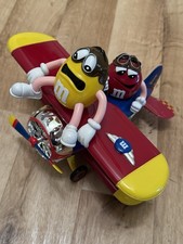 M&M Figur (Spender) als Flieger