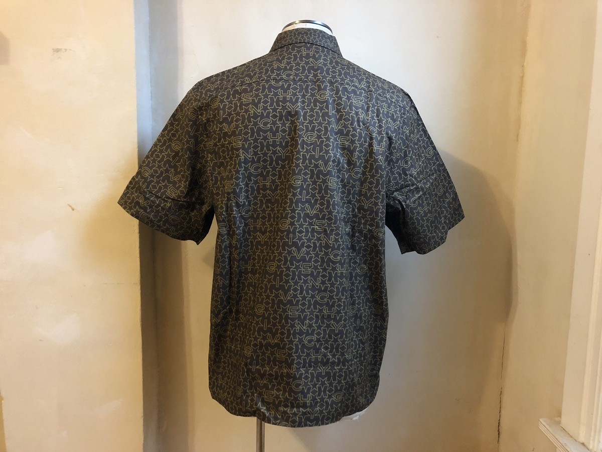 GIVENCHY RUNWAY BROWN STARS ALLOVER LOGO PRINT WITH BLACK BOLD ZIP