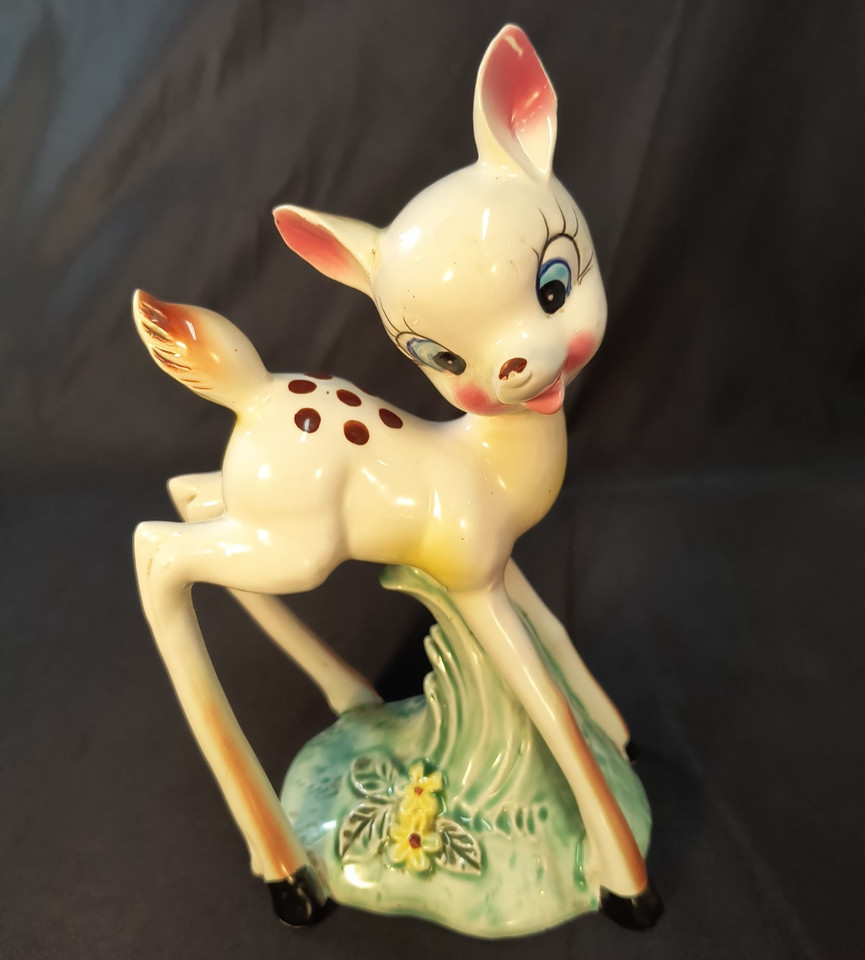 Rare anthropomorphic fawn figurine from Japan — the kind of wide-eyed kitsch that stops guests in their tracks and sparks instant conversation.