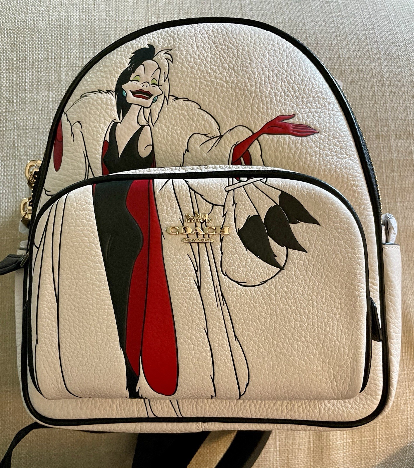 Coach x Disney Court Backpack featuring Cruella de Vil