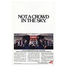 1983 TWA: Not a Crowd In the Sky Vintage Print Ad
