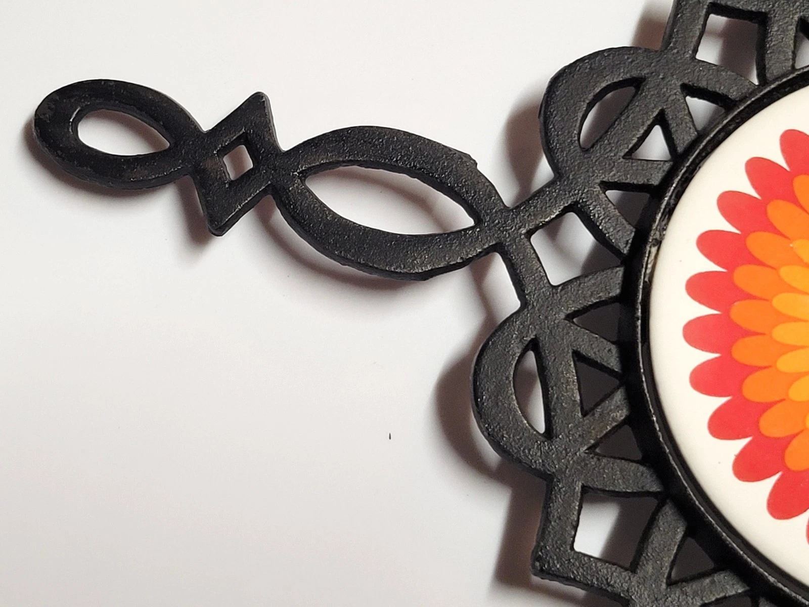 vintage 1970s psychedelic floral cast iron trivet and hot pad - product detail image 17