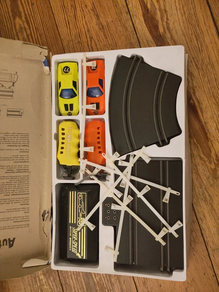 Autorennbahn 80er: Komvolut aus zwei Sets für Ergänzung und Ersatzteile - Bild 2 von 4