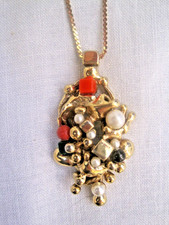 brutalist end of day plated pendant necklace with faux pearls