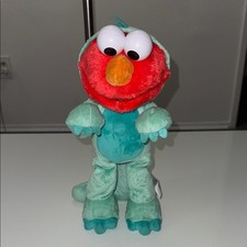 Sesame Street Dino Stomp Elmo 13-Inch Plush Stuffed Animal Sings and Dances