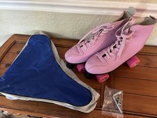 Pink Hightop Women's Roller Skates with Blue Carry Bag and Accessories