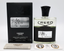 Creed Aventus 120ml bottle with black cap, black box, and two oval portraits of historical figures.