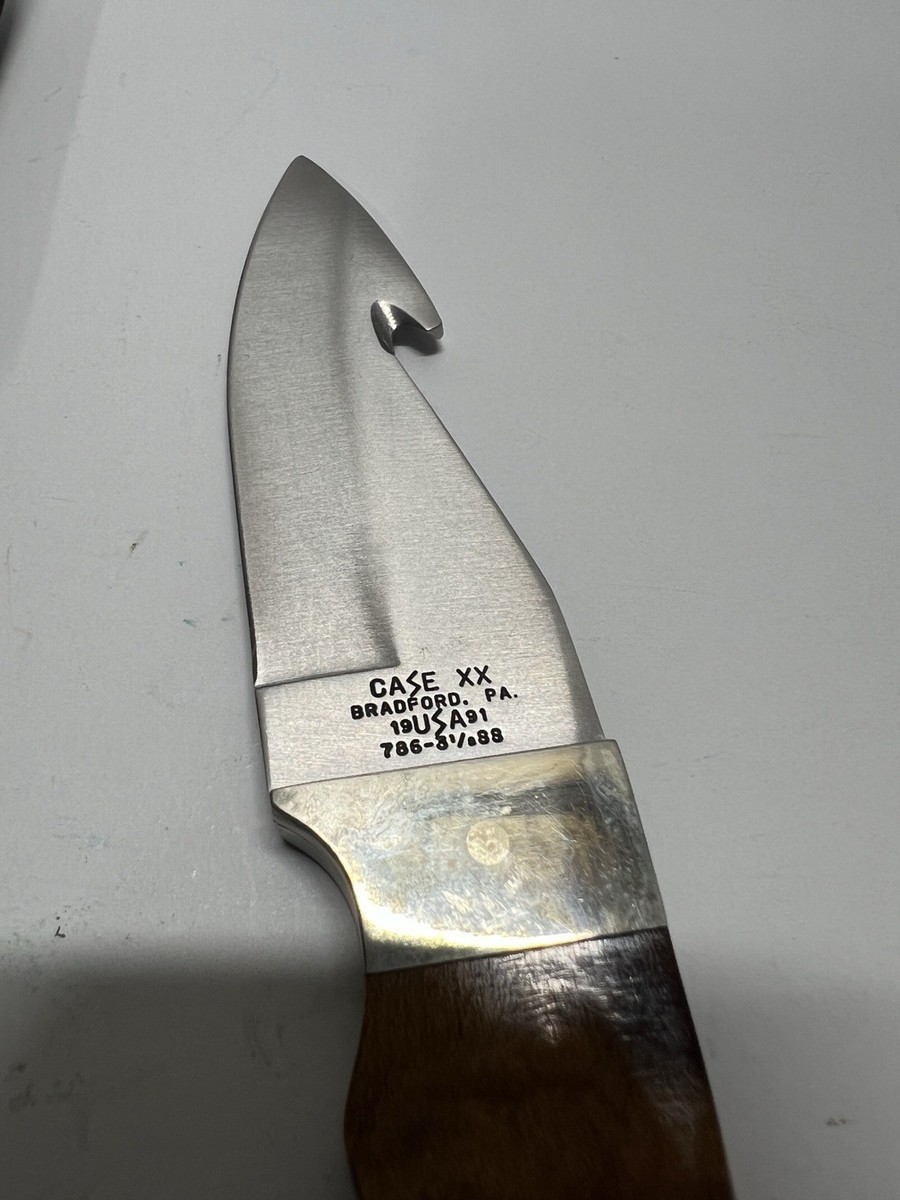 Case XX 786 3.5 SS hunting knife with wooden handle and leather