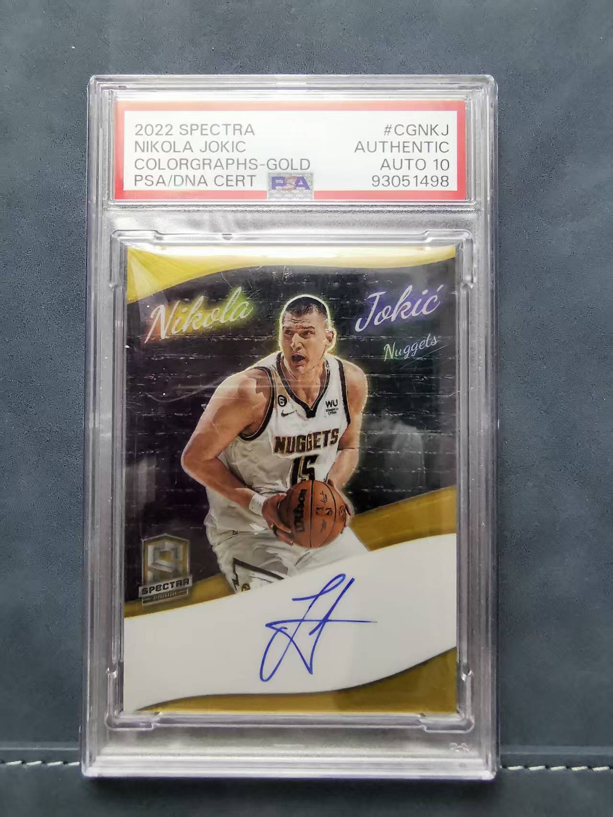 Nikola Jokic 2022-23 Panini Spectra Colorgraphs Gold Prizm /10 Auto PSA 10 DNA