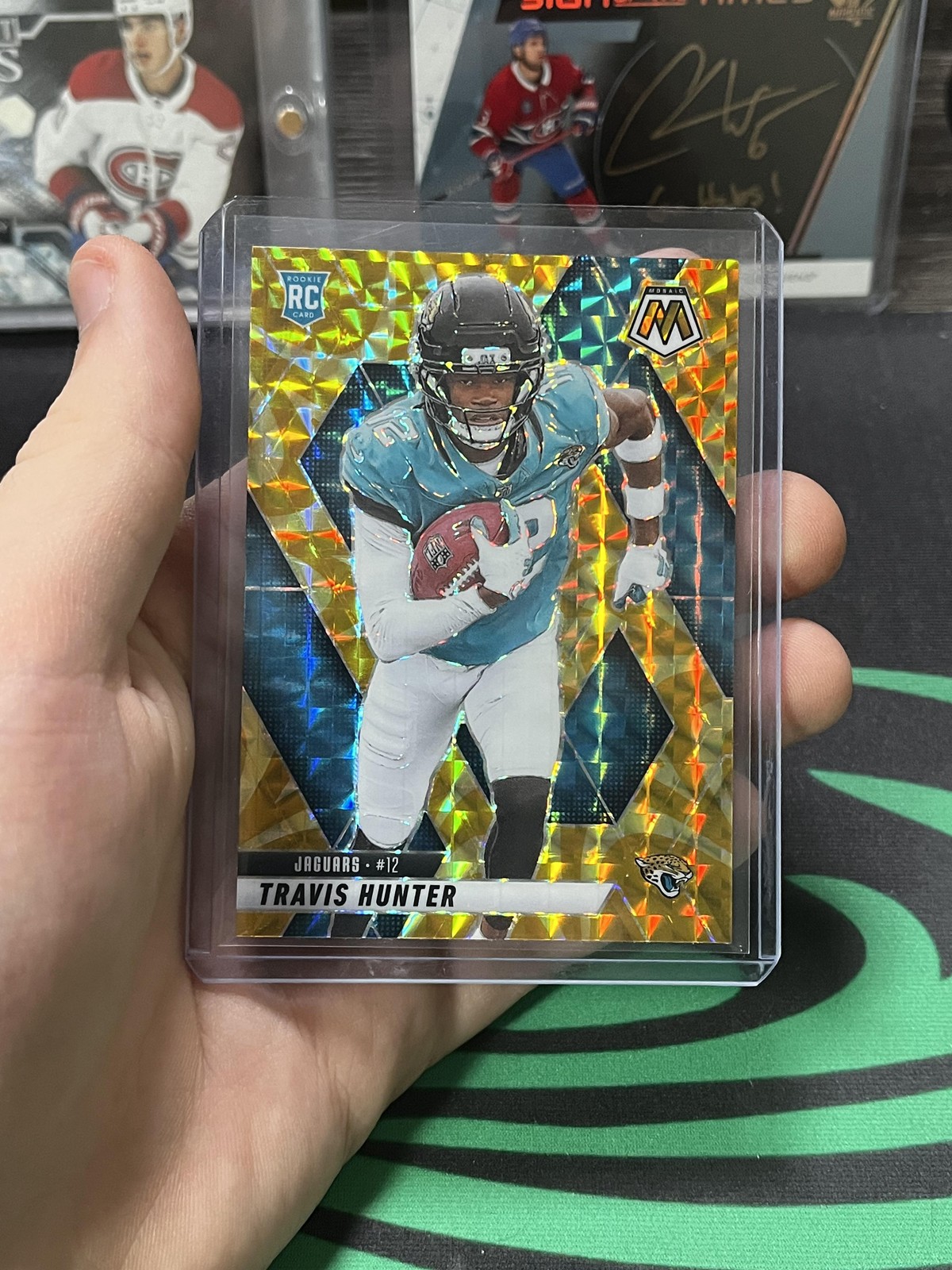 2025 Panini Mosaic #301 Travis Hunter Mosaic Reactive Yellow