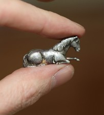 antique Japanese silver miniature Okimono of a resting horse, 19th century MEIJI