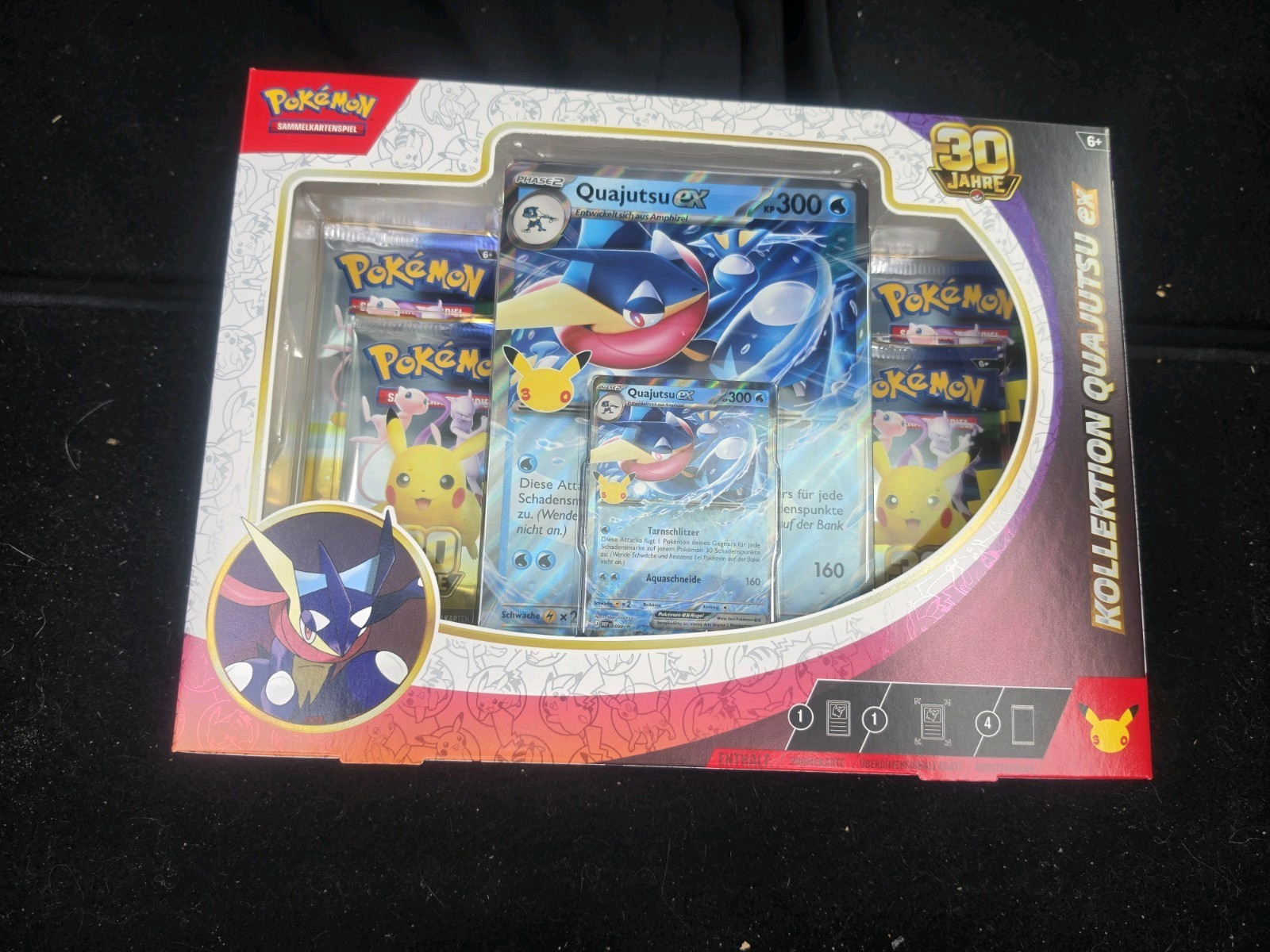 Pokémon-Sammelkartenspiel Kollektion Quajutsu ex 30 Jahre, 4 Booster, Deutsch