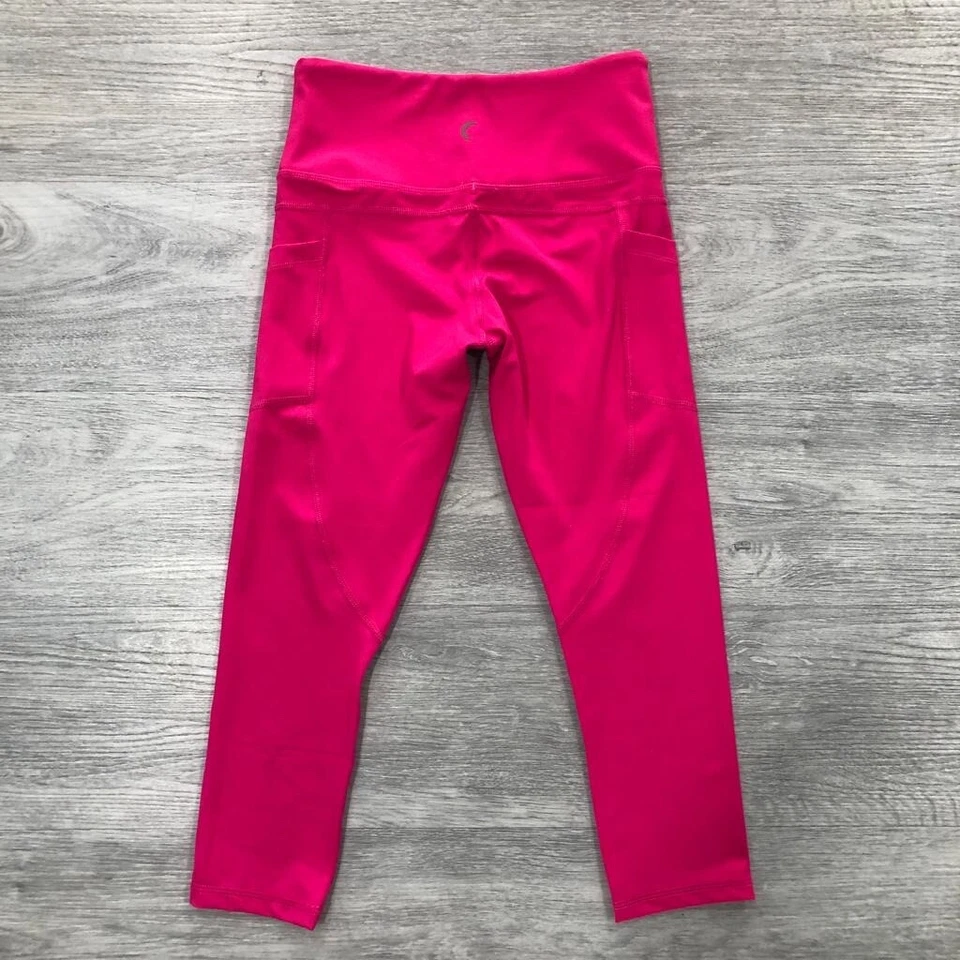Legging capri ZYIA Active para mujer 4 fiestas rosa claro N ajustado tiro medio bolsillo Foto 4 de 4