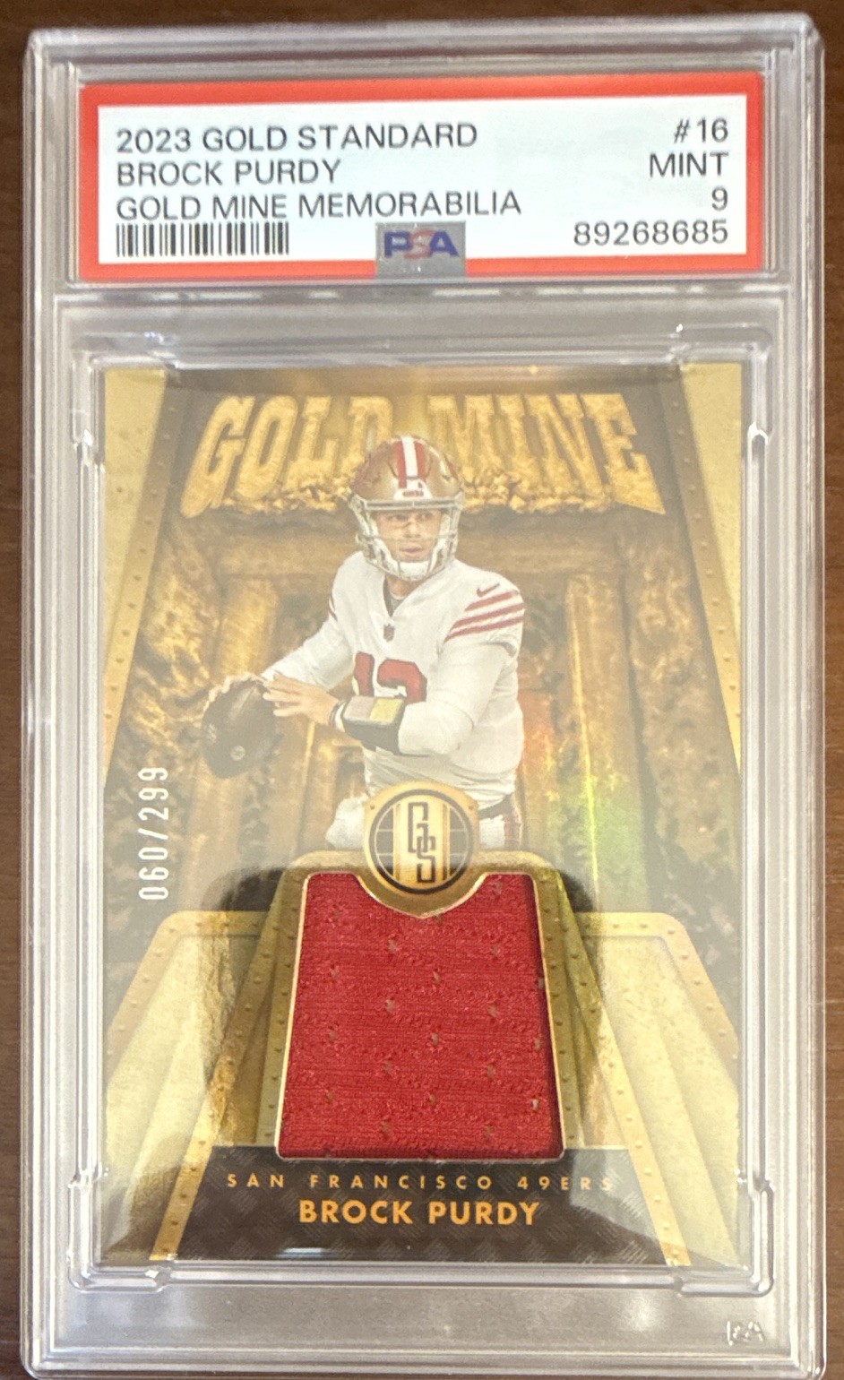 Panini 2023 Gold Standard Brock Purdy Gold Mine Memorabilia #16 PSA 9 /299