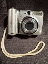 Canon PowerShot A580 - Silver -working condition-battery cover chipped READ 