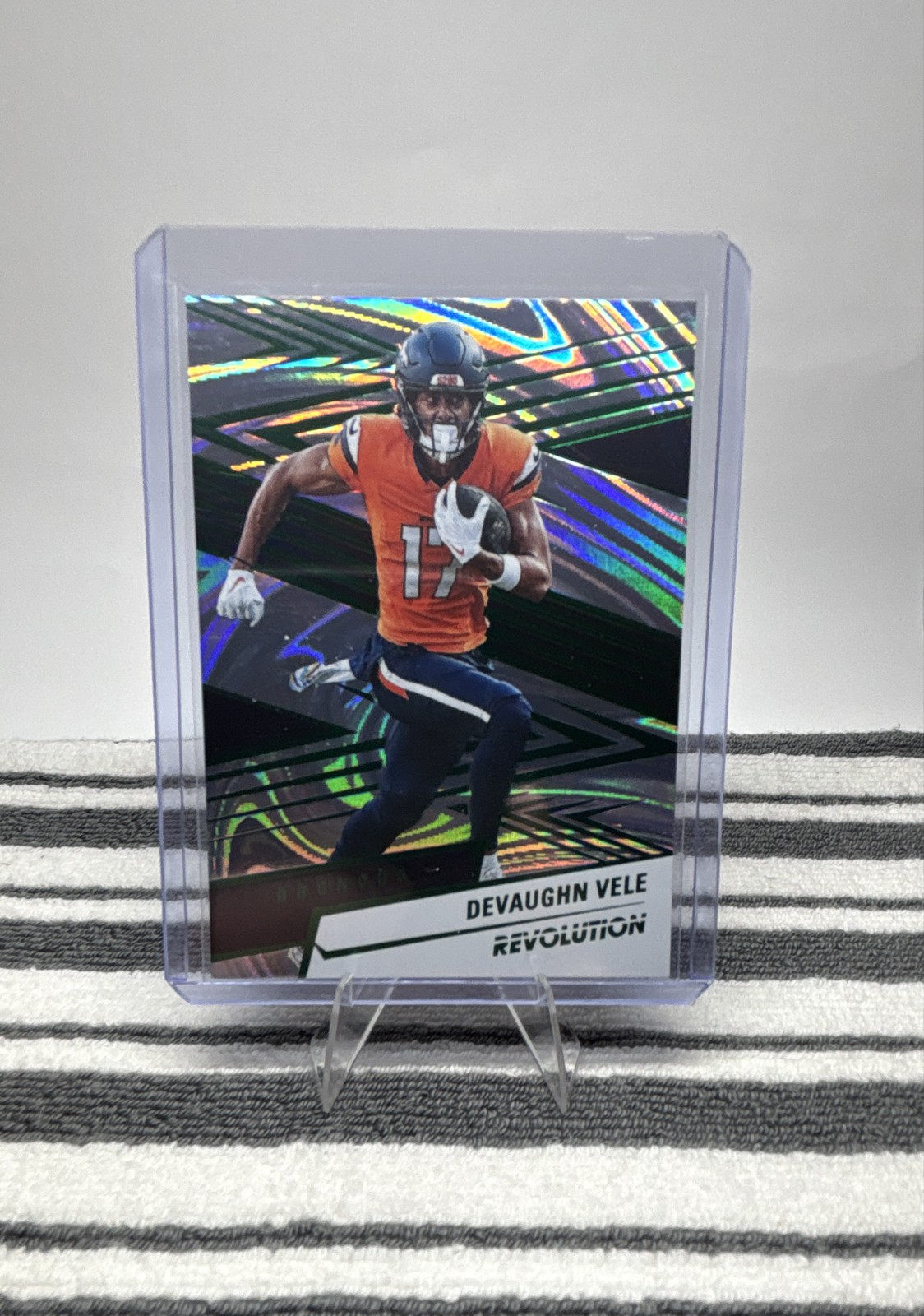 2025 Panini Revolution - Devaughn Vele #47 Green Swirl /199