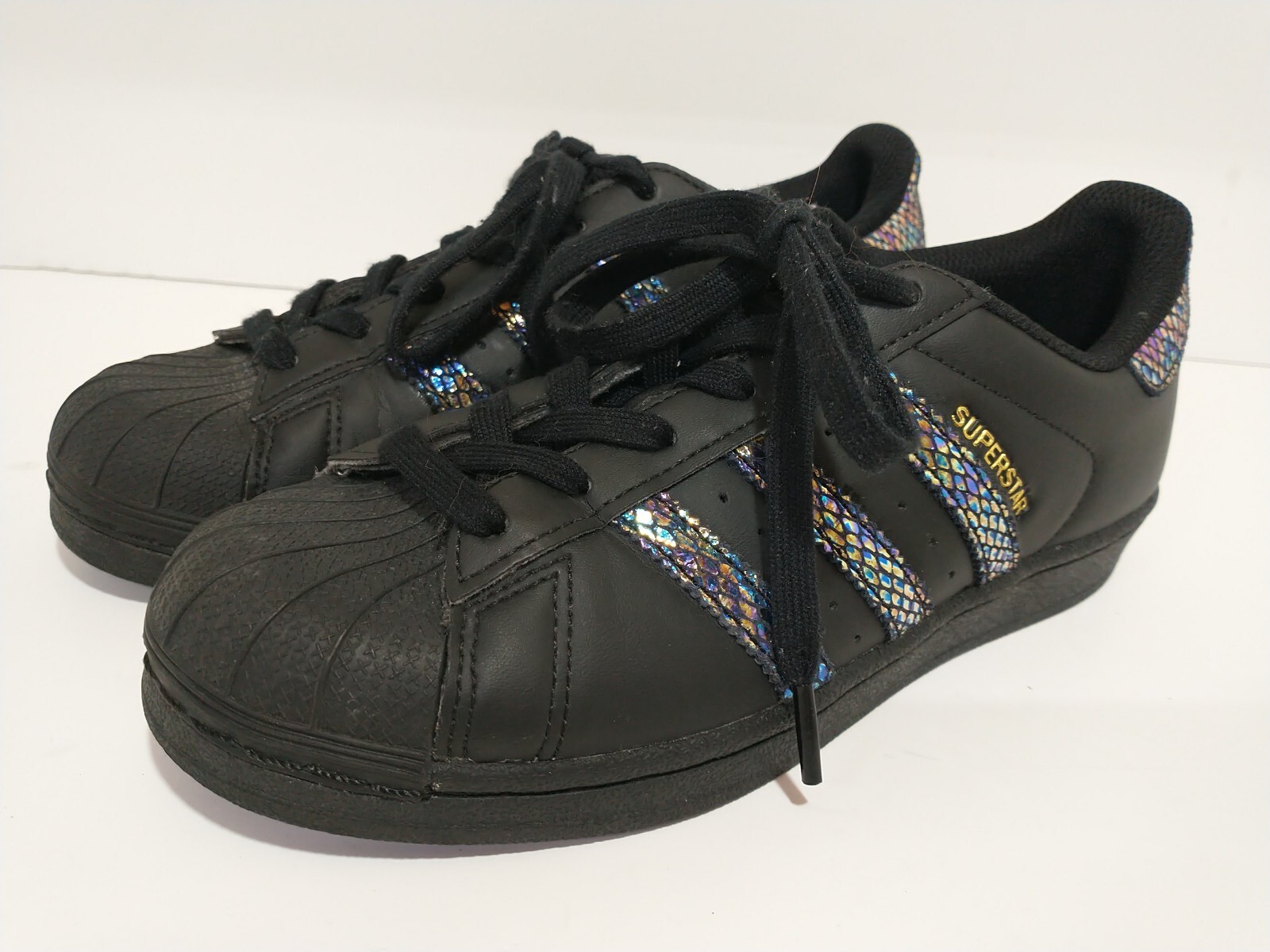 black iridescent adidas superstars