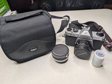 Pentax K1000 35mm SLR Film Camera with 50mm lens Skylight Filter Film Bag Tested