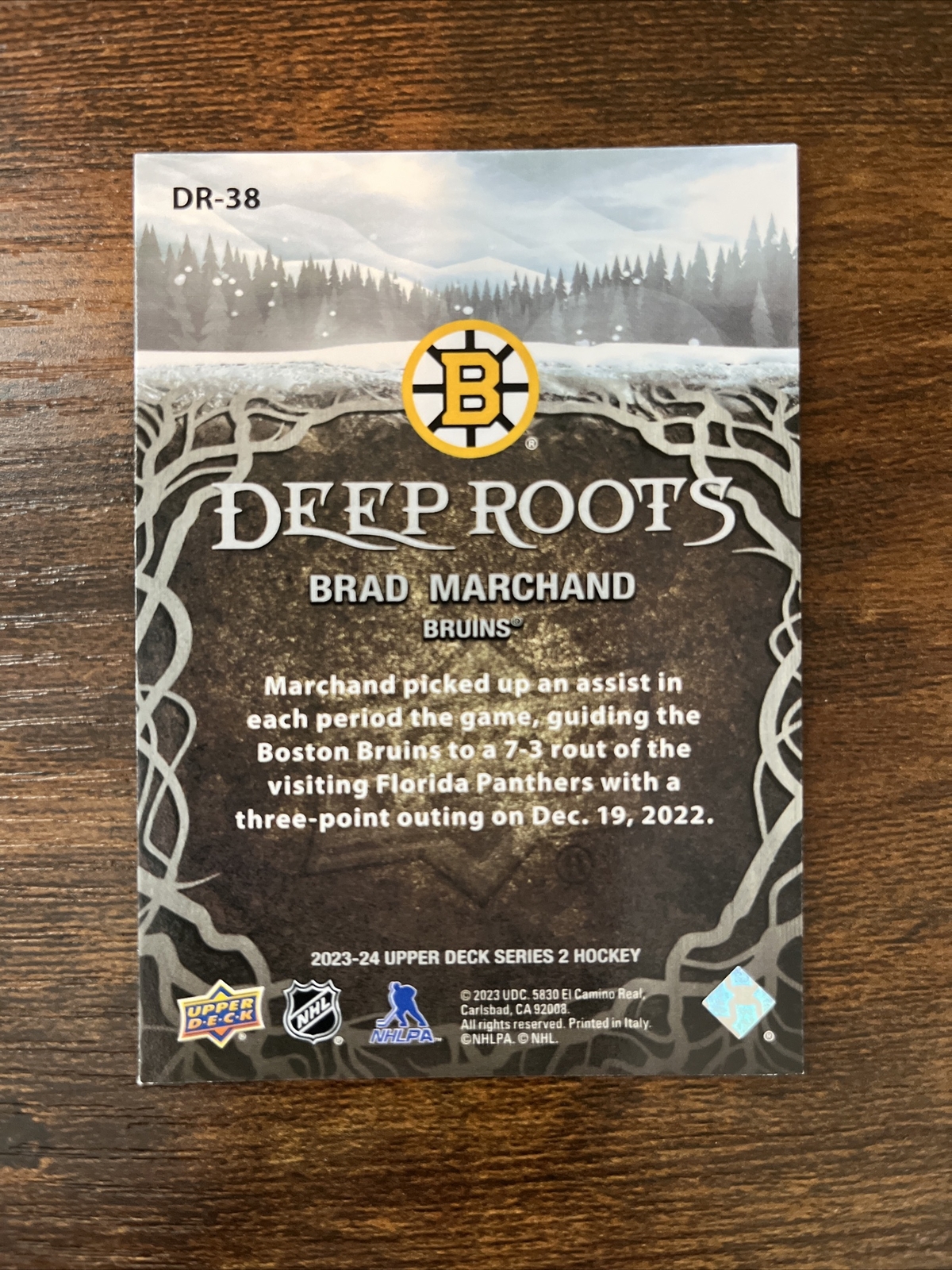 2023-24 Upper Deck Deep Roots #DR-38 Brad Marchand Boston Bruins
