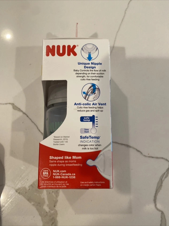 Botella anticólicos de flujo suave NUK, 5 oz. Indicador de temperatura seguro. Silicona 0+mes Foto 4 de 4