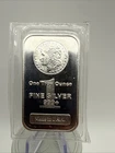 1oz Highland Mint .999 Fine Silver Bar – Morgan Dollar Design – Sealed in OMP #1