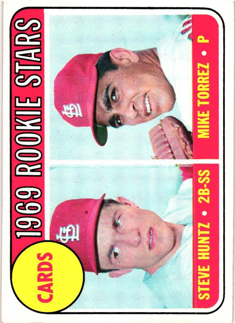 Cardinals 1969 Rookie Stars: Steve Huntz / Mike Torrez #136 Baseball Cards 1969 Topps trading card — raw and PSA graded price guide