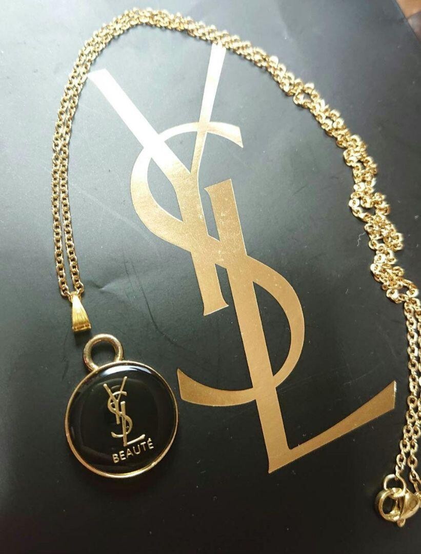 Collana Yves Saint Laurent logo YSL BEAUTE rotonda oro misura catena 50 cm con scatola