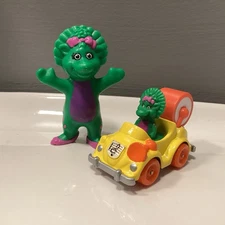 Vintage The Lyons Group Barney Friend Baby Bop Dinosaur Figure & Yellow Car Set