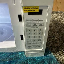 GE 0.7 Cu. Ft. 700W Small White Compact Countertop Microwave (No Mounting Kit)