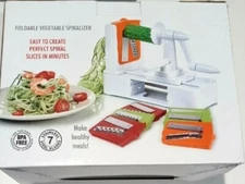 Foldable vegetable spiralizer with food holder,  rotating handle & 7 blades NIB