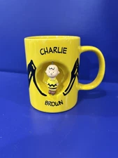 2012 Peanuts Worldwide LLC Charlie Brown Spinner Coffee Mug