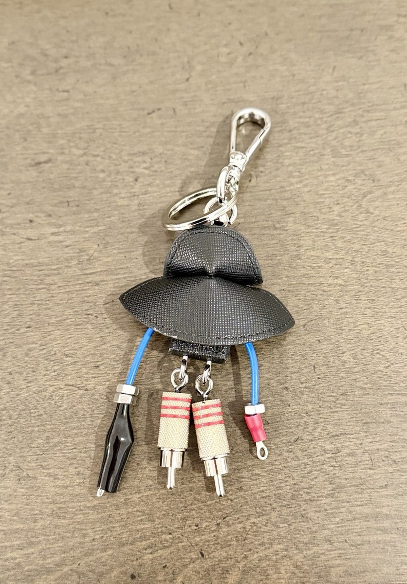 Prada Robot Keychain with Red Cape and Metallic Details | eBay