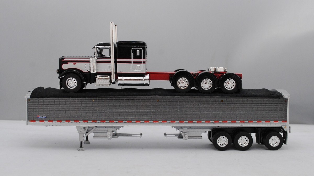 DCP 1/64 Red Black Silver Tri-Axle Peterbilt 389 Wilson Tri