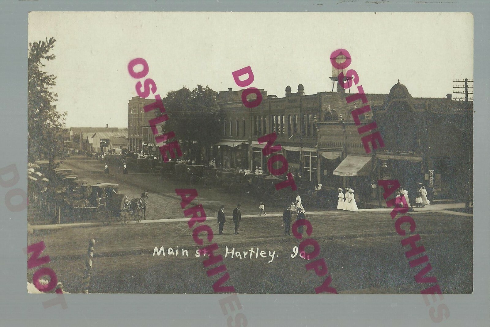 Hartley IOWA RPPC c1910 MAIN STREET nr Sheldon Sanborn Everly Primghar