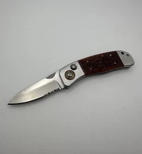 Rare CRKT 7243 Patent Pending Lakes Pal Button Lock Folding knife Unused