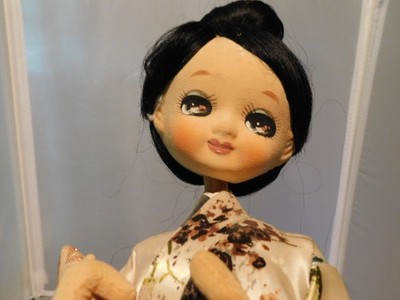 Antique Sakura doll with original label and clothing.  16.5''' x 3.5'' preowned