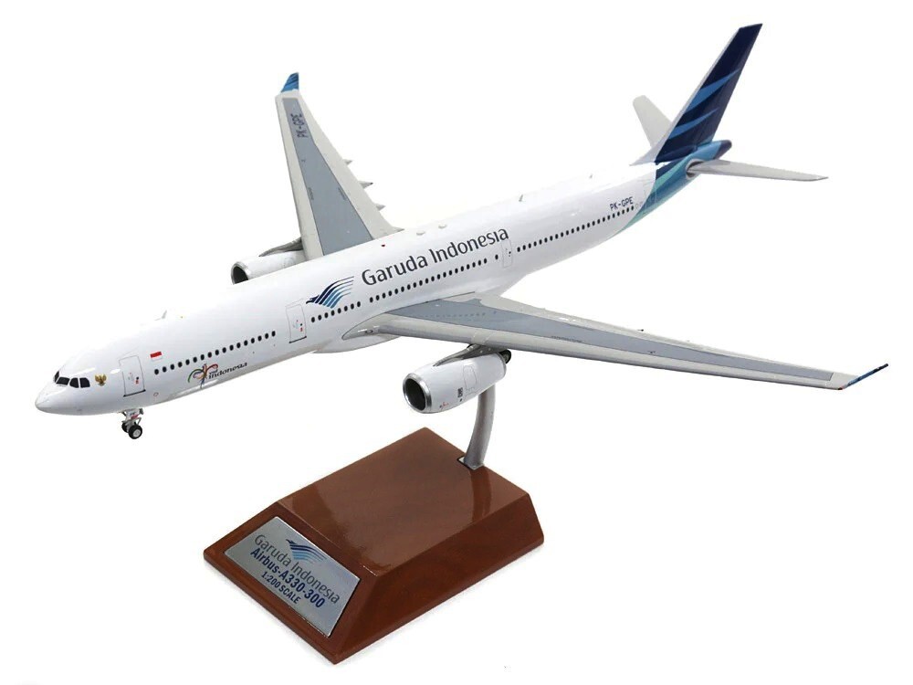 AIRBUS A330-341 GARUDA INDONESIA REG: PK-GPE WITH STAND