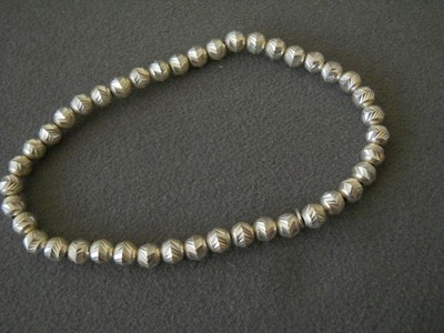 Italian Sterling Silver Chased Bead Strung on Nylon Stretch Bracelet