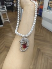Synthetische Perlenkette mit Anhänger Leopar...