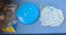 1966 Whamo-O FRISBEE flying disc, light blue color, throwing instructions