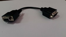 RS-232 Male to Female 9 pin extension cable:  8 inches long.  Great port saver 