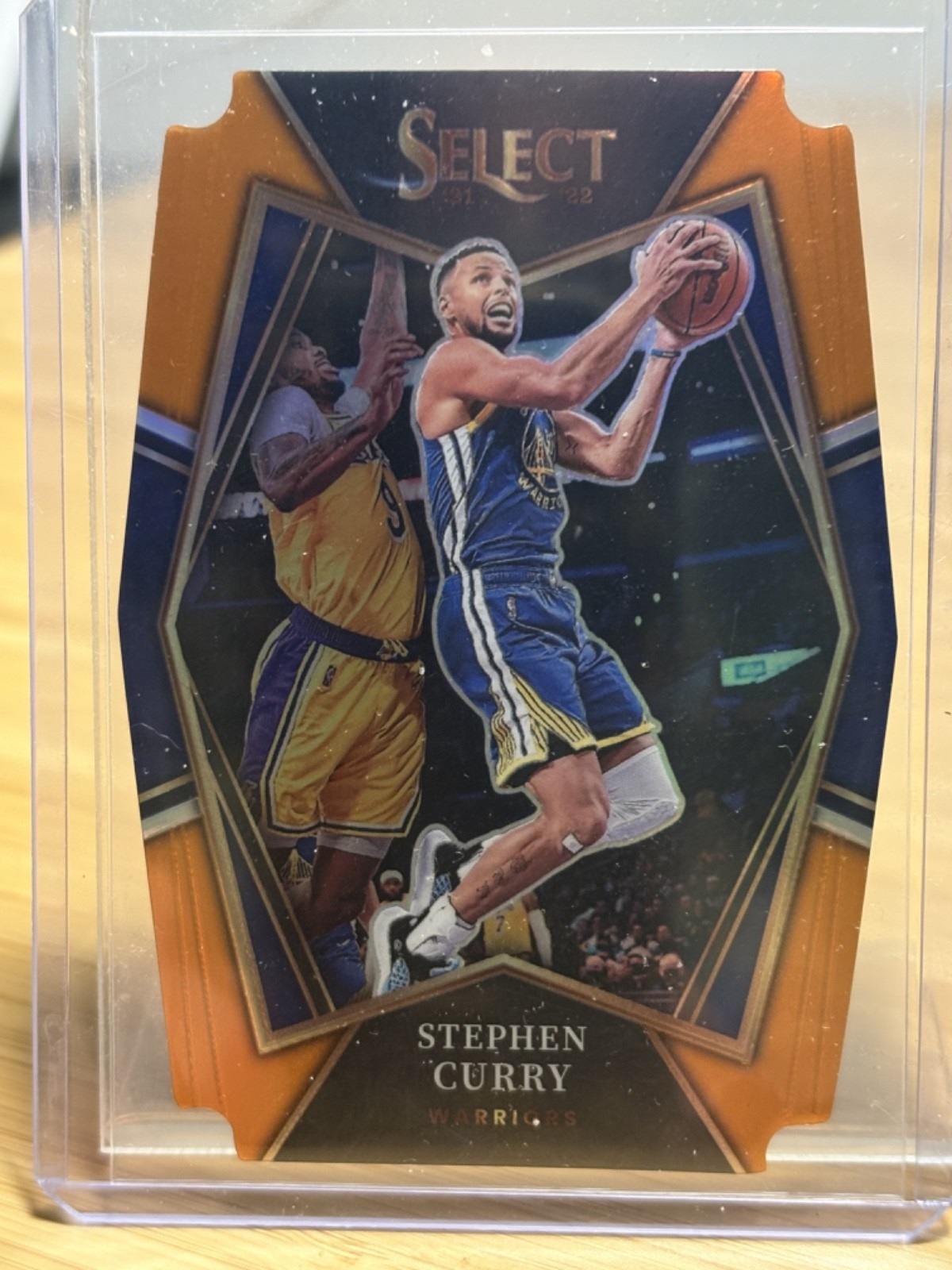 2021-22 Panini Select Premier Level Stephen Curry 121 Orange Prizm Die-Cut 60/65