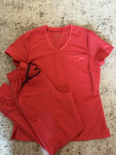 Jaanuu Women's Scrubs Set. Top is small and bottoms xsmall