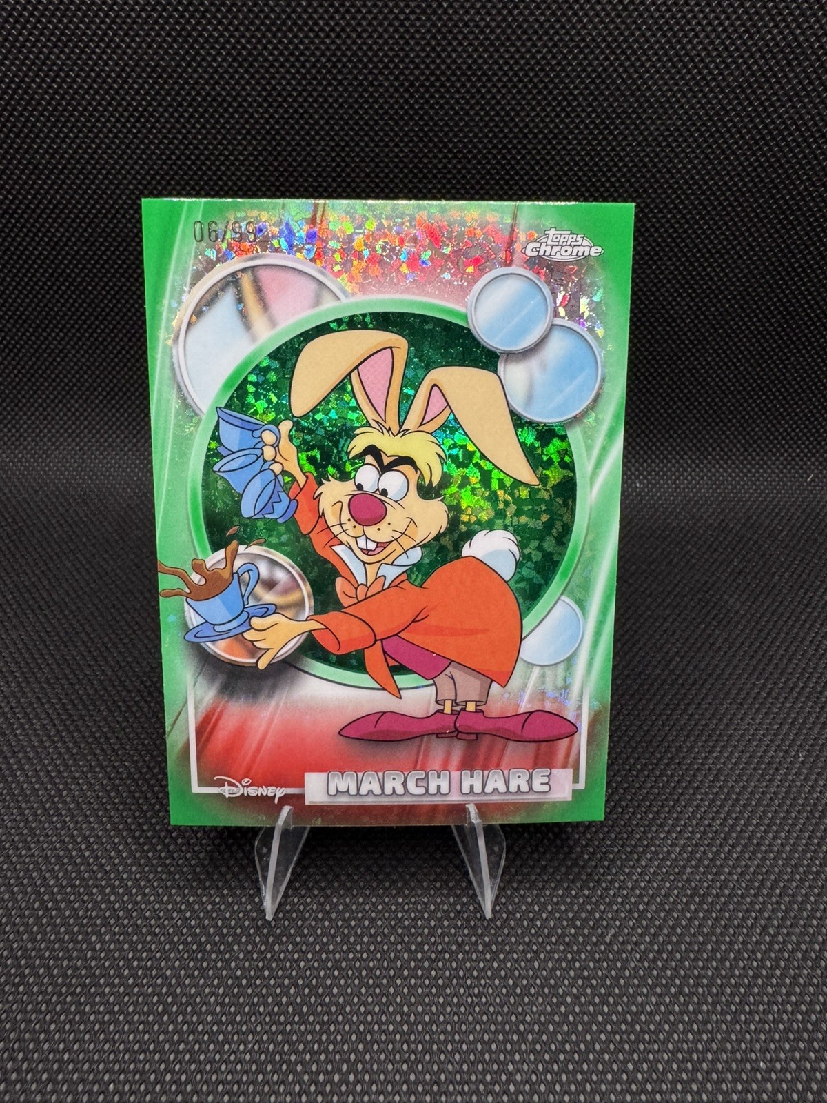 Topps Chrome Disney 100 2026 March Hare #79 Green Parallel Serial Numbered /99