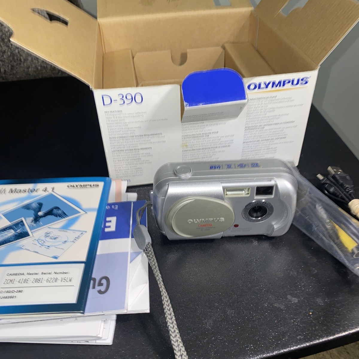 Olympus Camera D-390 2.0MP Compact Digital Camera & Paperwork